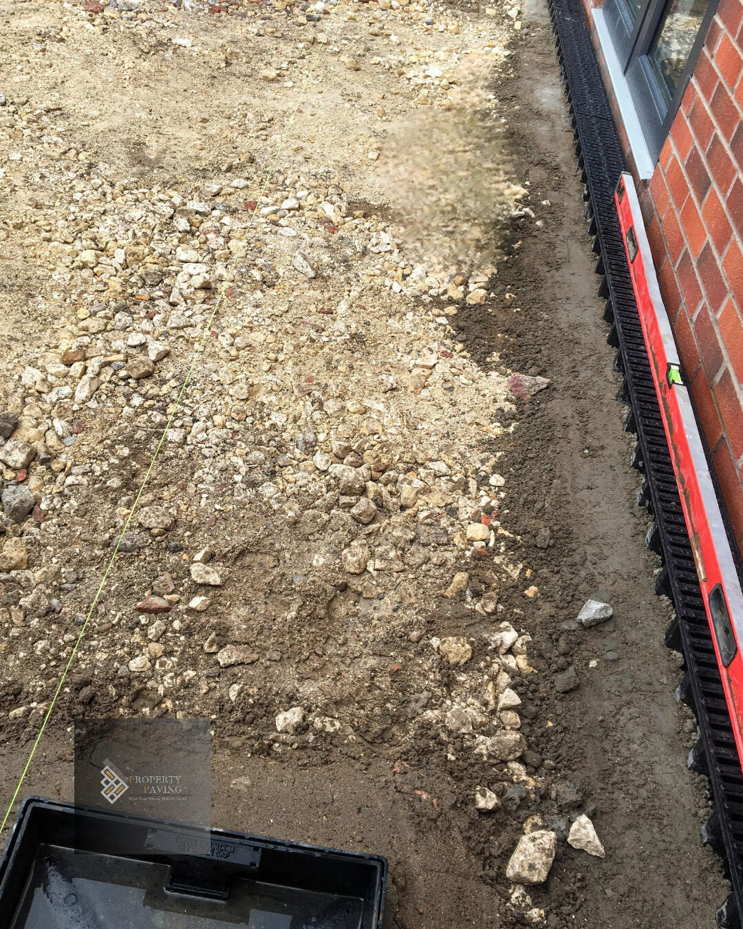 Drainage installation set to correct falls before paving work begins