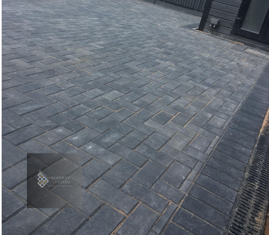 Block paving driveway installed on a prepared sub-base with correct drainage and levels.